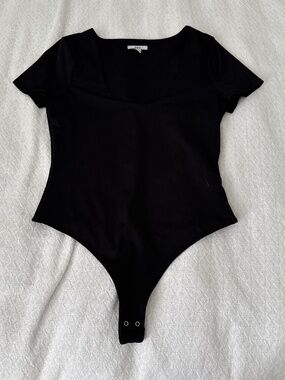 short sleeve bodysuit   size large   details: -no flaws  -perfect condition  -sn